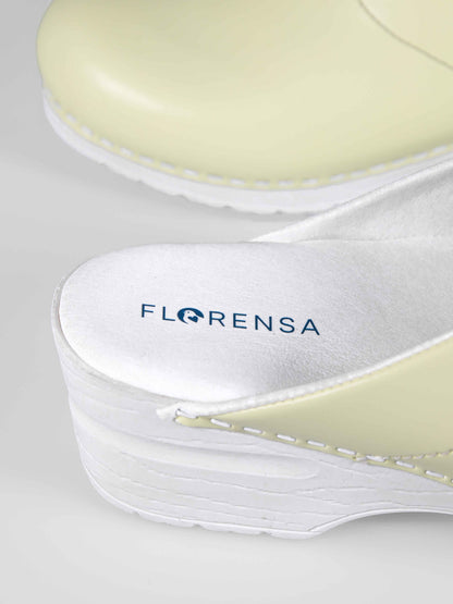 Florensa logo in butter yellow medische klomp, klomp voor de zorg